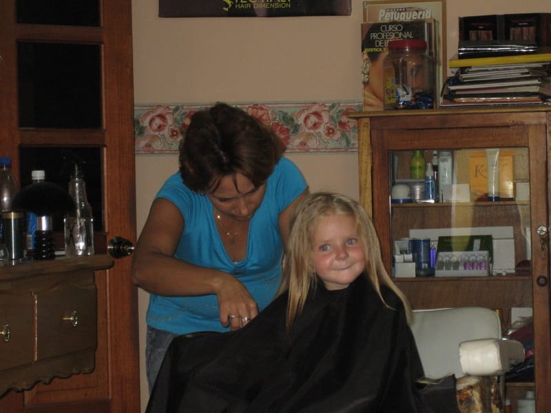 Marie getting her hair cut