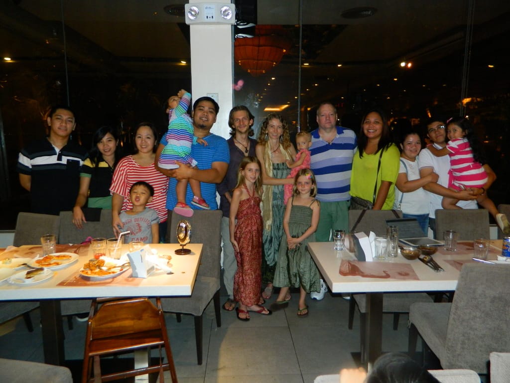 Programmers and families near Manila