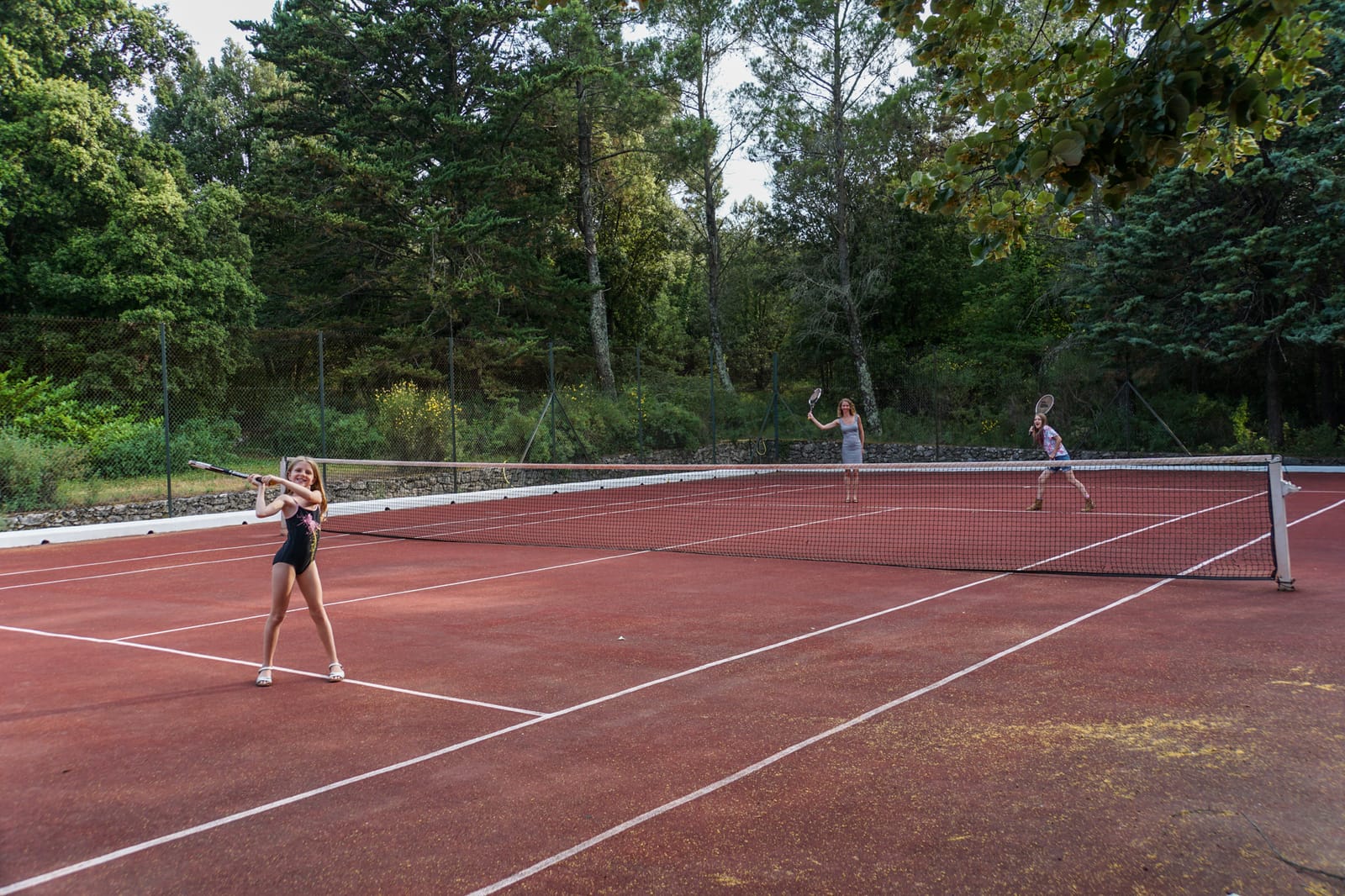 First time trying tennis. We loved it (even though we weren't very good at it)!
