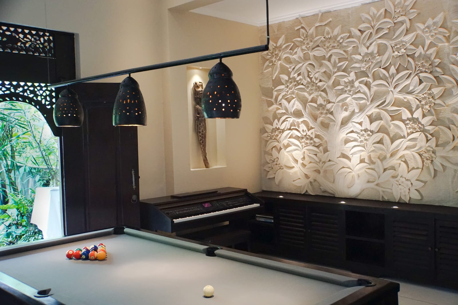 new pool table toward art wall