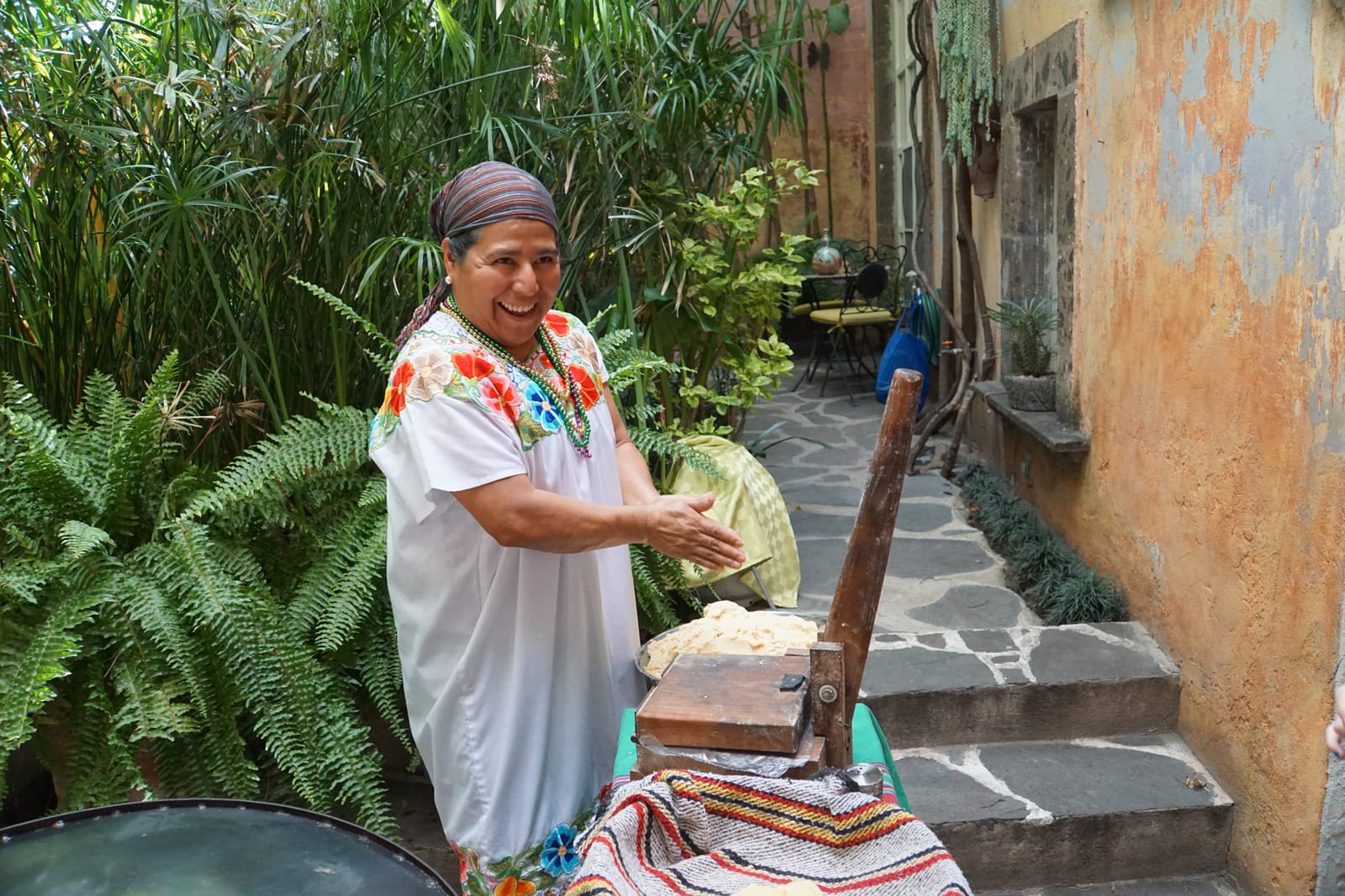 Mexican woman making fresh tortillas